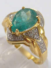 Appraisal: A yellow metal tests carat gold pear shape emerald and