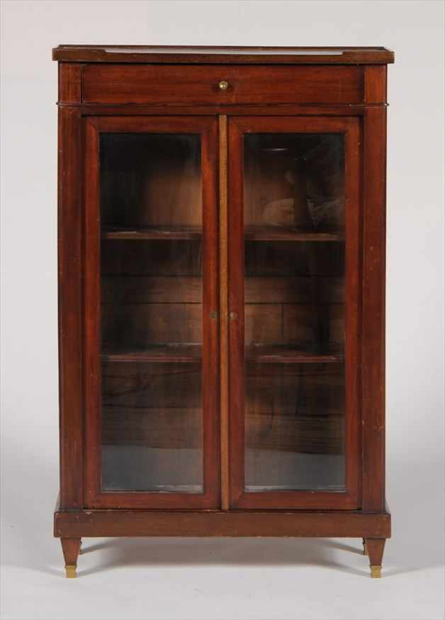 Appraisal: DIRECTOIRE FRUITWOOD TWO-DOOR SIDE CABINET With glass doors and adjustable