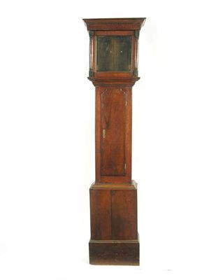 Appraisal: A George III oak longcase case the hood with a