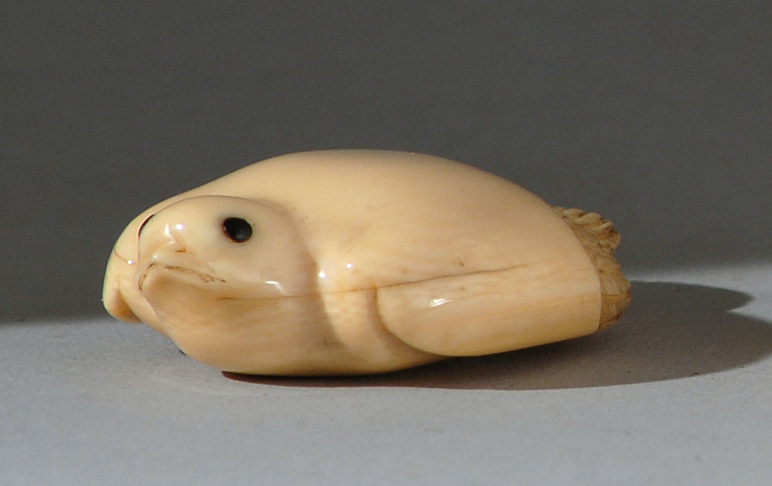 Appraisal: IVORY NETSUKE th CenturyBy Kagetoshi In the form of a