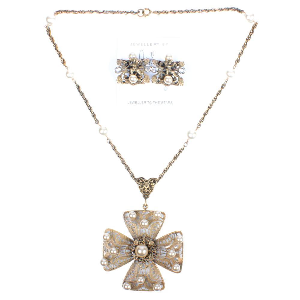 Appraisal: JOSEFF OF HOLLYWOOD GOLD TONE CROSS PENDANT NECKLACE AND CHERUB