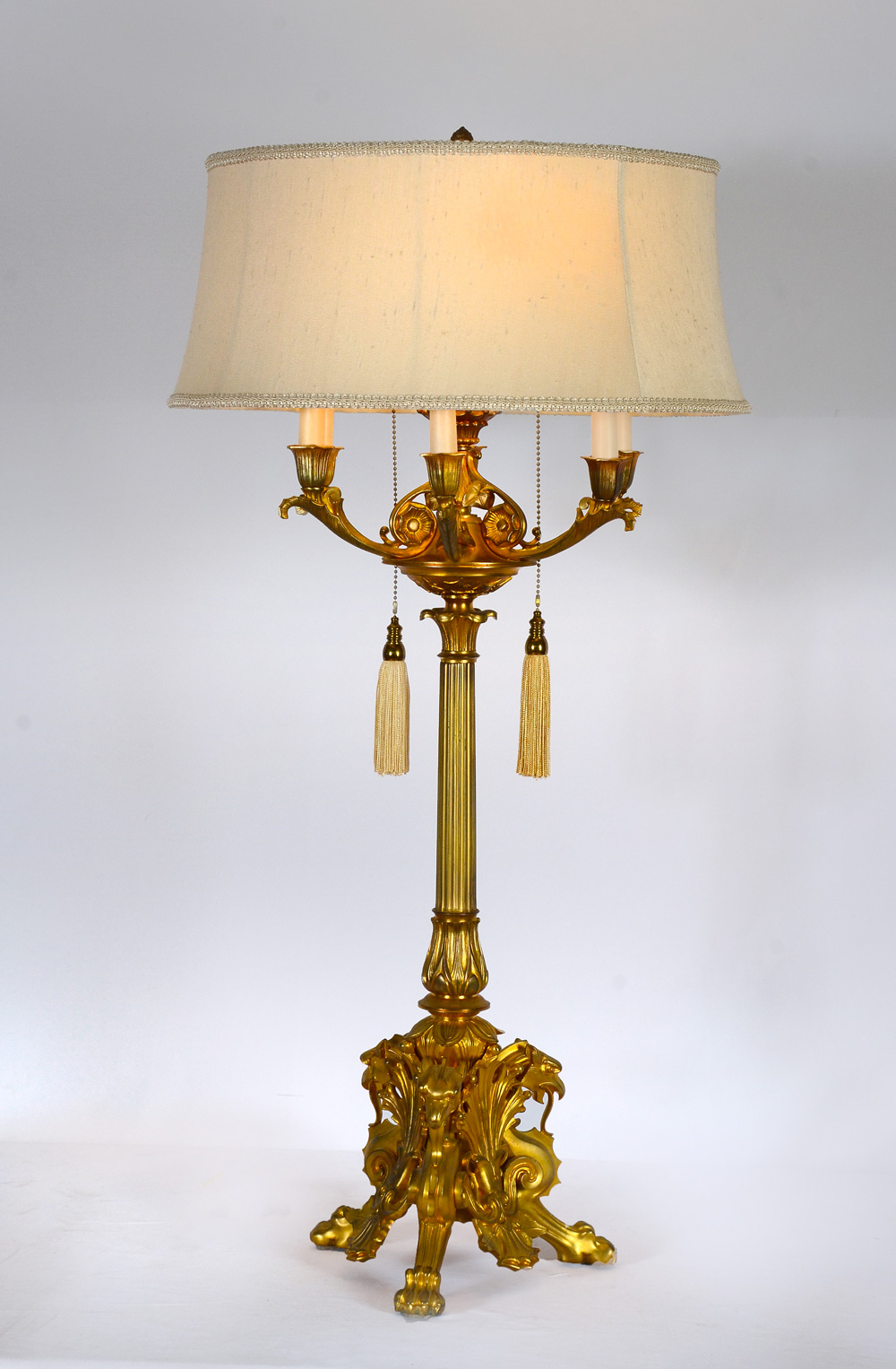 Appraisal: GILT BRONZE GRIFFIN TABLE LAMP Large Gilt bronze table lamp