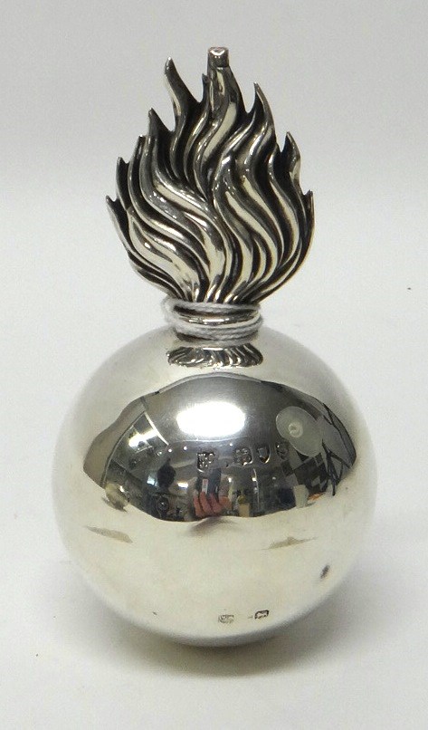 Appraisal: A Victorian silver table lighter formed as a flaming spherical