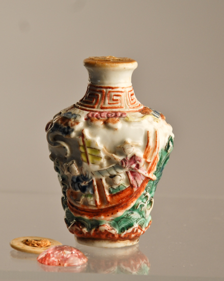 Appraisal: A th C Molded and Polychromed Porcelain Snuff Bottle having