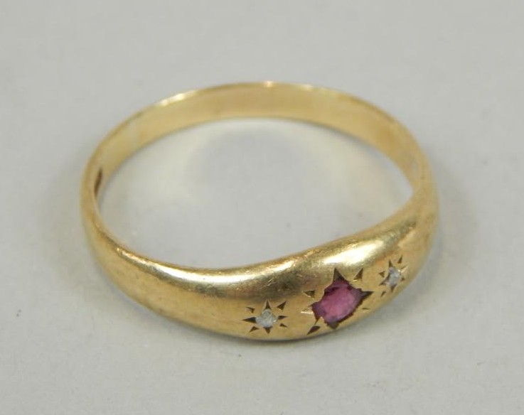 Appraisal: An ct gold ruby and diamond dress ring with three