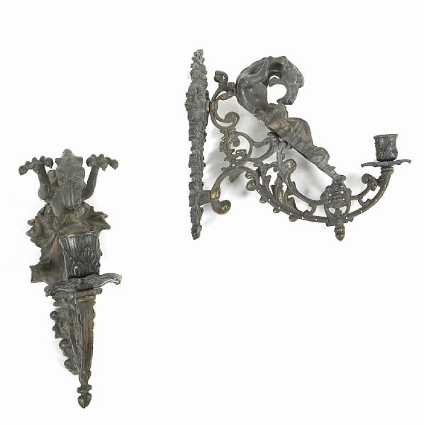 Appraisal: A pair of bronze wall sconces height in width in