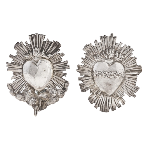 Appraisal: Two silver repousse ex voto heart plaques th c one