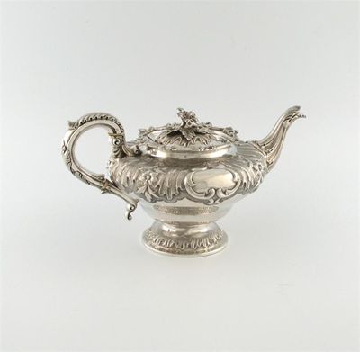 Appraisal: A George III silver teapot by John Emes London of