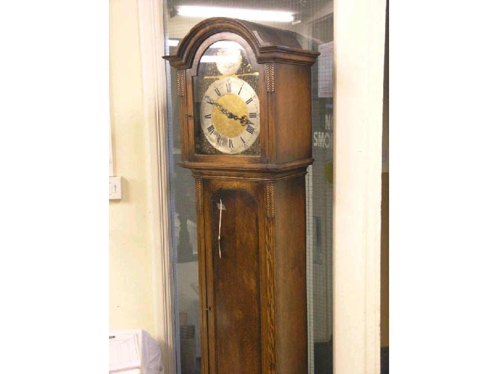 Appraisal: A 's oak longcase clock traditional arched dial with movement