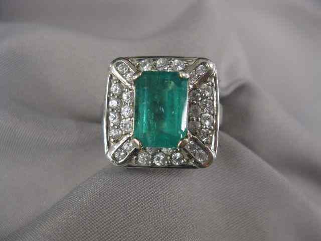 Appraisal: Emerald White Sapphire Ring fine rectangular gem surrounded by round