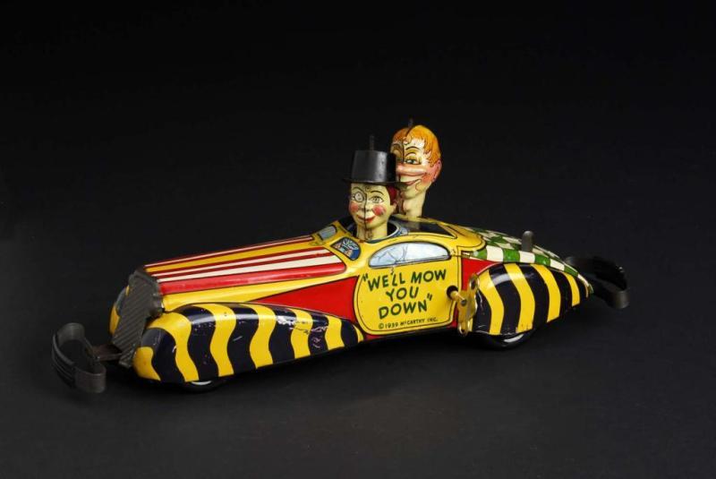 Appraisal: Tin Marx Charlie McCarthy Snerd Private Car Toy Description American