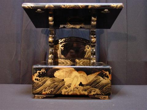 Appraisal: JAPANESE BLACK AND GOLD LACQUER BOOKREST Fashioned as a slanted