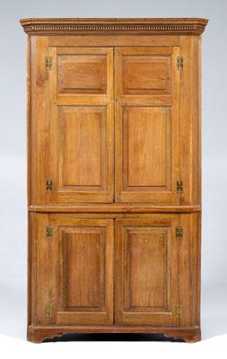 Appraisal: Southern Chippendale corner cupboard walnut one-piece construction four paneled doors