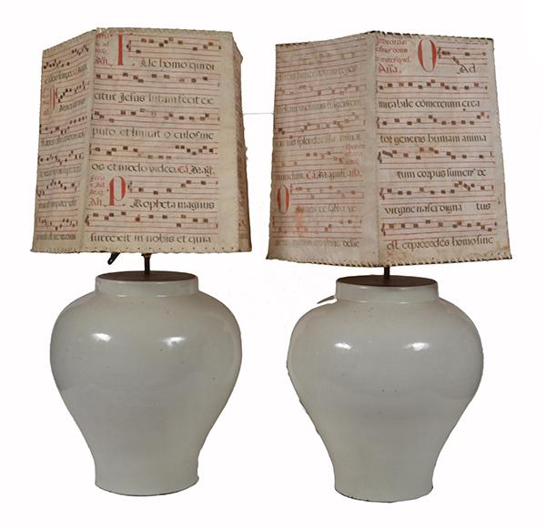 Appraisal: A PAIR OF LARGE WHITE-GLAZED BALUSTER-SHAPED LAMPS with parchment shades