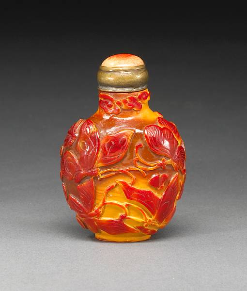 Appraisal: A hornill snuff bottle carved with butterflies Cleverly utilizing the