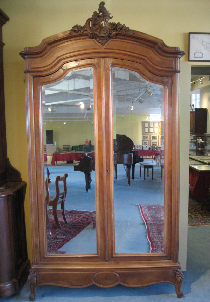 Appraisal: An E th C French Armoire of walnut and walnut