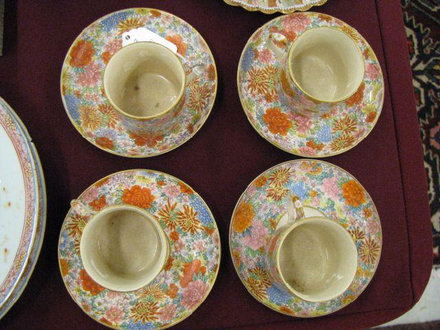 Appraisal: Set of Satsuma Pottery Cups Saucers elaborate overall florals