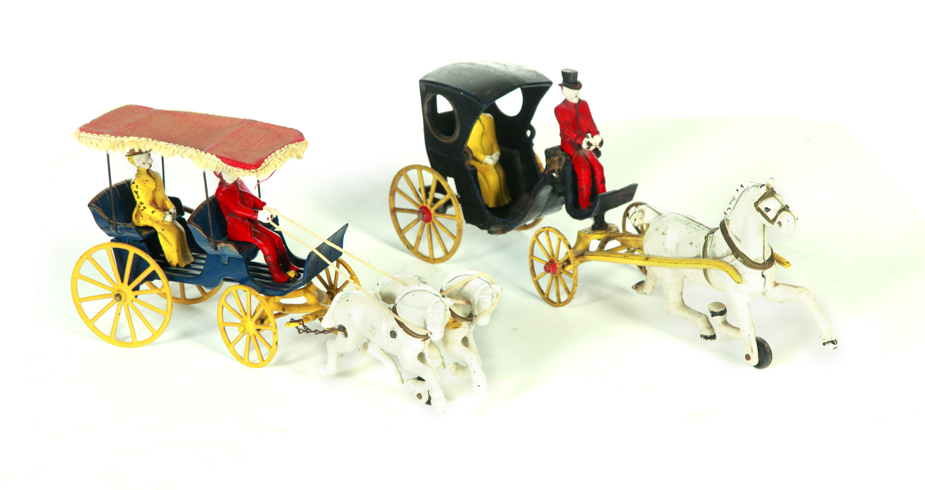 Appraisal: TWO KENTON CAST IRON CARRIAGE TOYS American mid th century