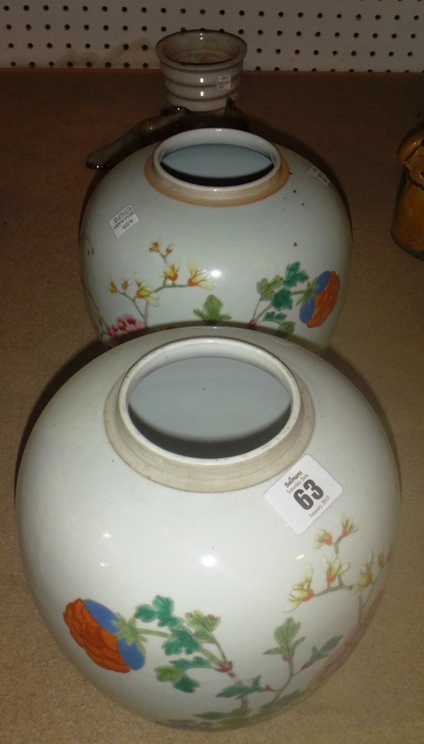 Appraisal: A pair of Oriental ginger jars lacking lids decorated with