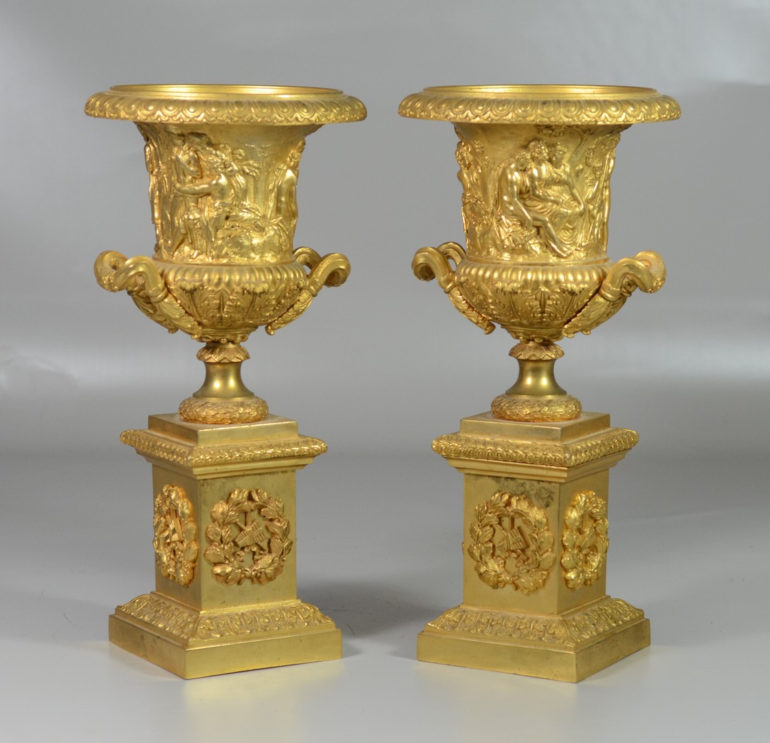 Appraisal: Pair of French gilt bronze ormolu double handled urns on