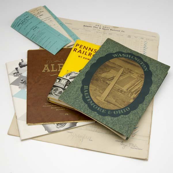 Appraisal: RAILROAD MEMORABILIA Including wooden whistles magazines photographs payroll stubs booklets