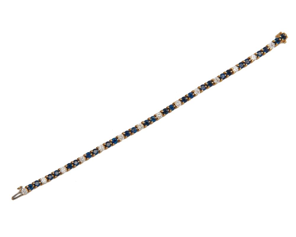 Appraisal: K Gold Sapphire and Diamond Line Bracelet prong-set with alternating