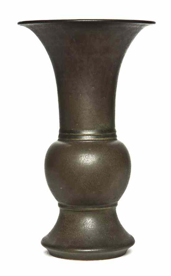 Appraisal: A Chinese Pottery Gu Form Vase having a monochrome dark