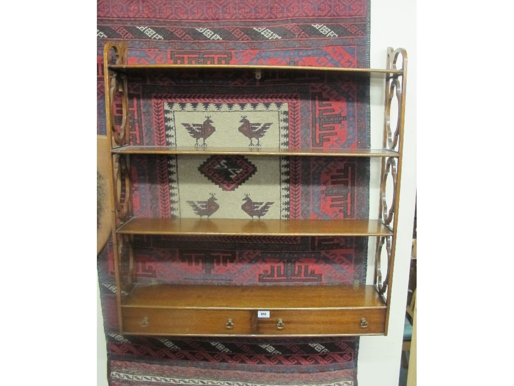 Appraisal: Edwardian mahogany wall shelf with drawers