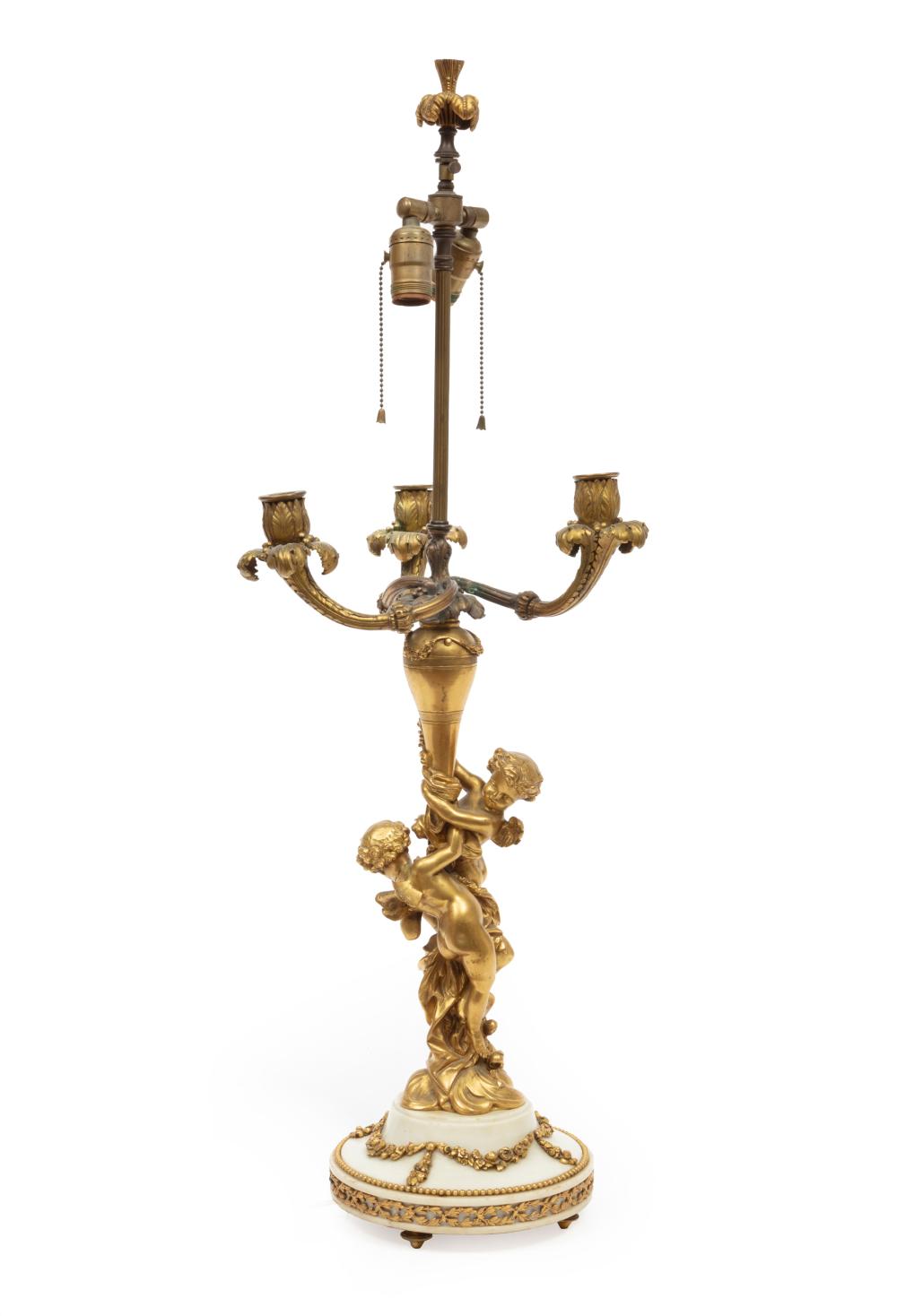 Appraisal: Napoleon III Gilt Bronze Three-Light Figural Candelabrum th c now