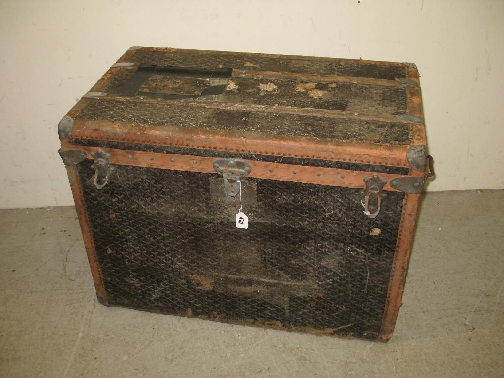 Appraisal: Malles Goyard Paris A travelling trunk with metal side handles