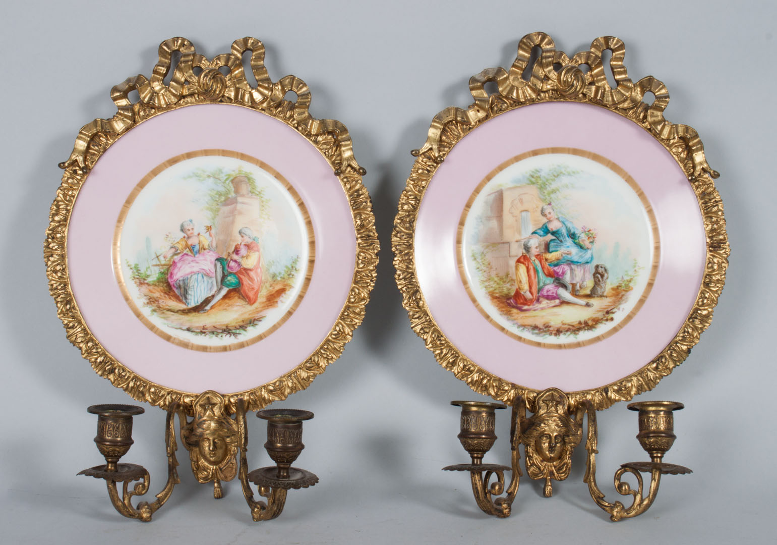 Appraisal: Pair of Continental porcelain plates th century mounted as sconces