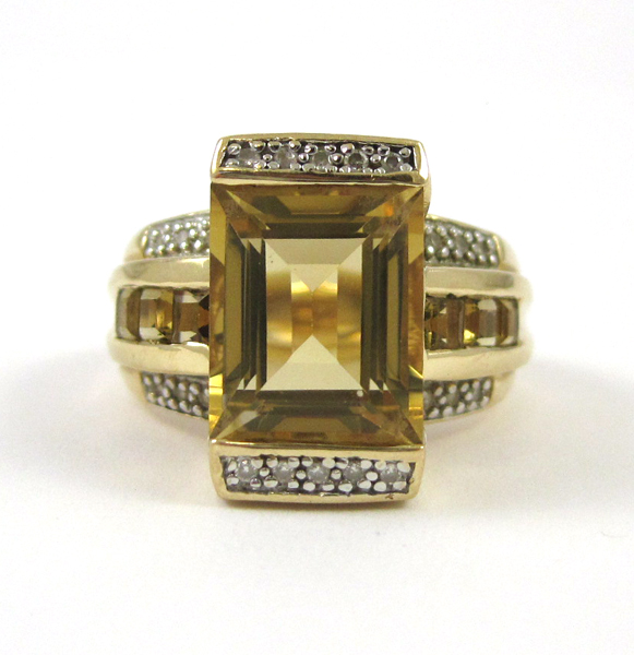 Appraisal: CITRINE DIAMOND AND FOURTEEN KARAT GOLD RING with round-cut diamonds