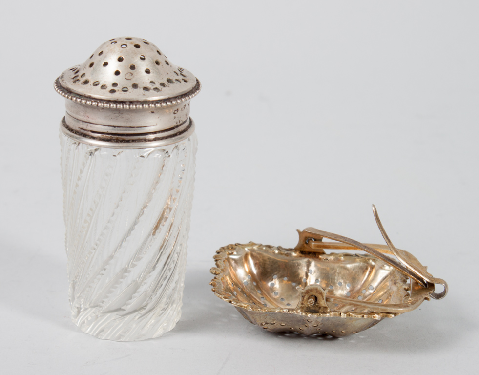 Appraisal: Russian silver tea strainer Hungarian shaker comprising a Russian gilt