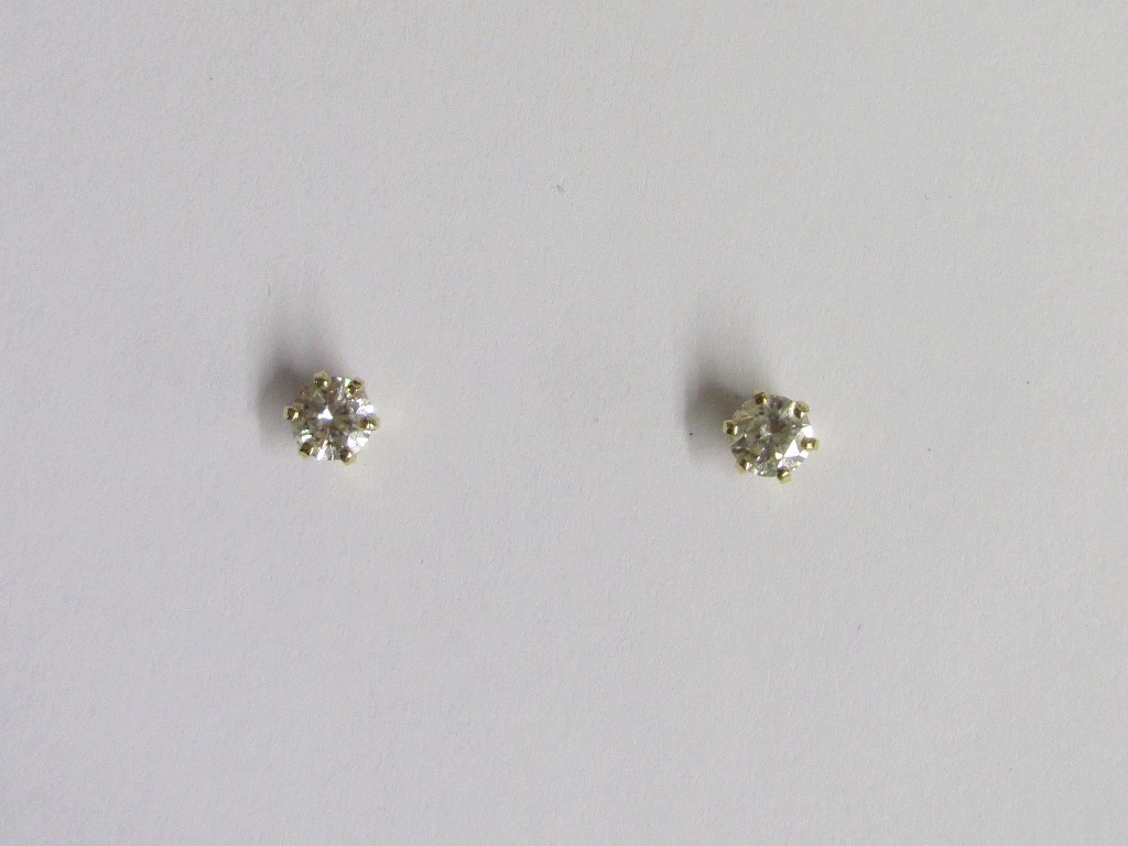 Appraisal: Pair of ct gold mounted diamond stud earrings with each