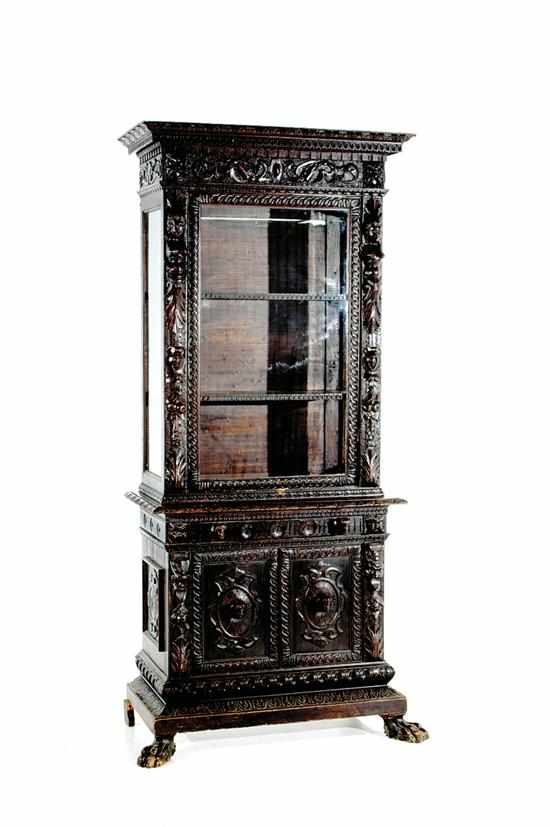 Appraisal: Jacobean Revival style carved walnut display cabinet late th century