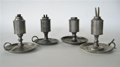 Appraisal: Four pewter cylindrical font chamber oil lamps james putnam malden