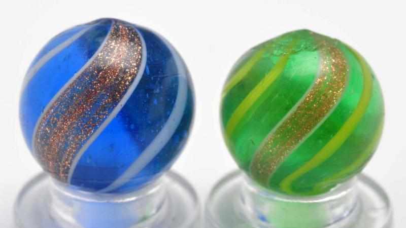 Appraisal: Lot of Colored Glass Lutz Marbles Description The smaller marble