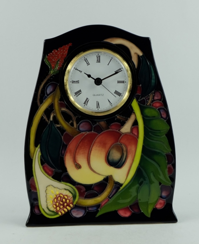 Appraisal: Moorcroft mantle clock decorated in the Queens Choice design dated