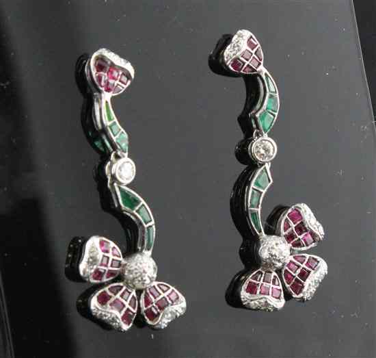 Appraisal: A pair of ruby emerald and diamond set white gold