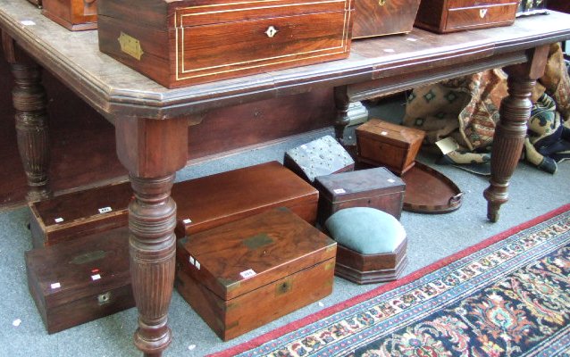 Appraisal: A late Victorian pine and mahogany dining table the canted