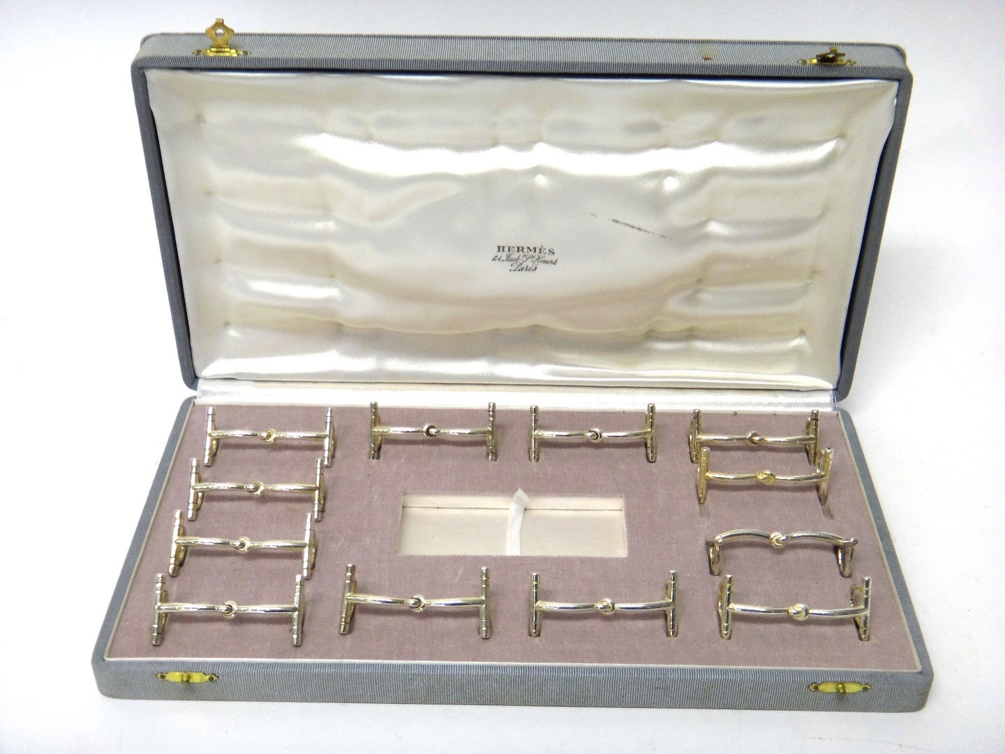 Appraisal: A set of twelve Hermes silver plated place name card