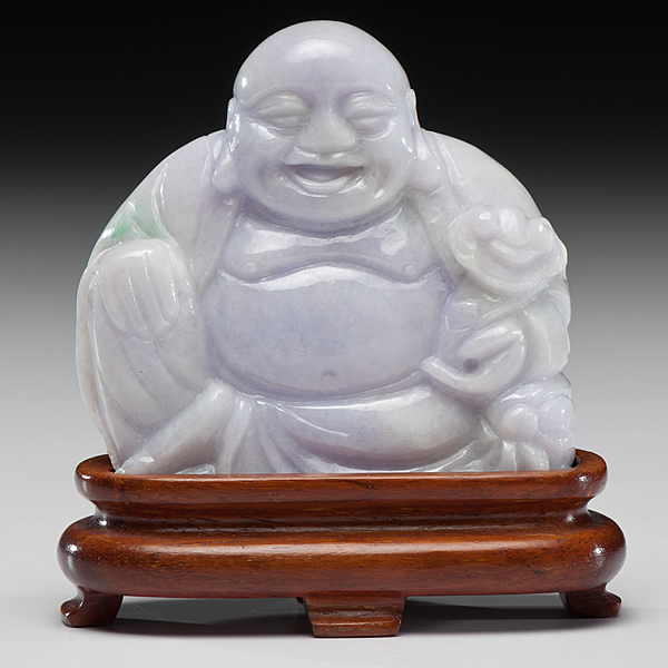 Appraisal: Chinese A carved lavender jadeite seated laughing Buddha resting on