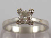 Appraisal: A white metal tests carat gold diamond solitaire ring the