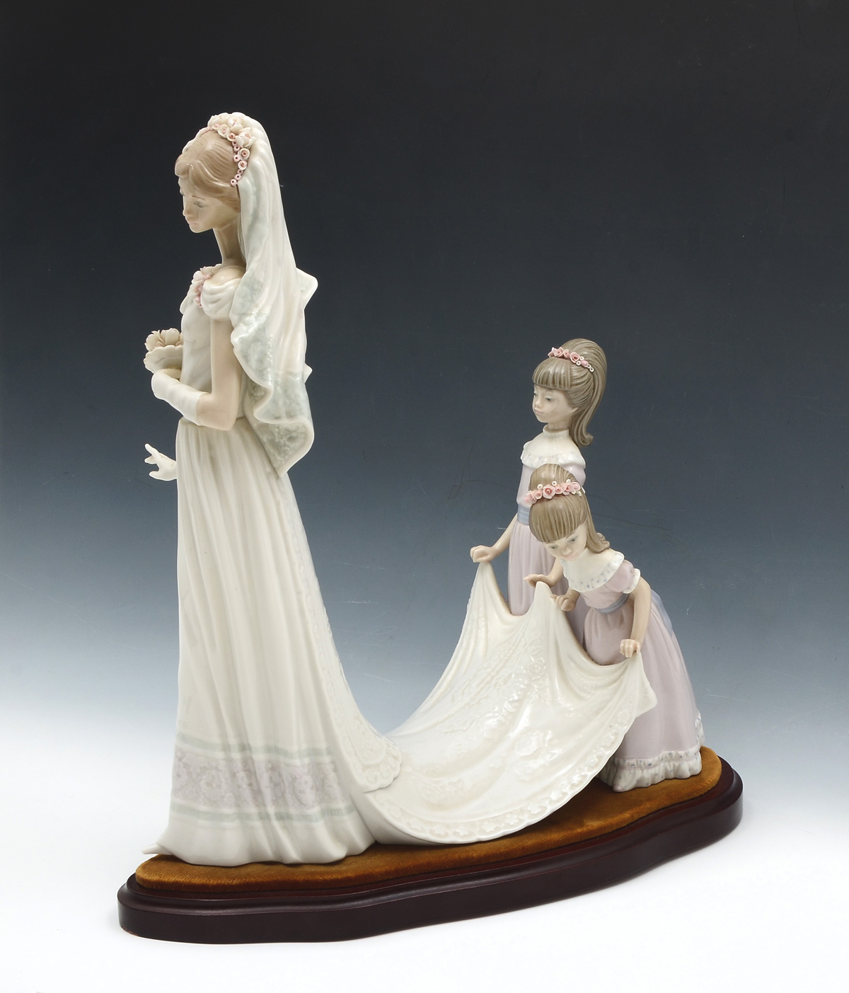 Appraisal: LLADRO PORCELAIN GROUPING ''''BRIDE'' Issued Retired Also included is a