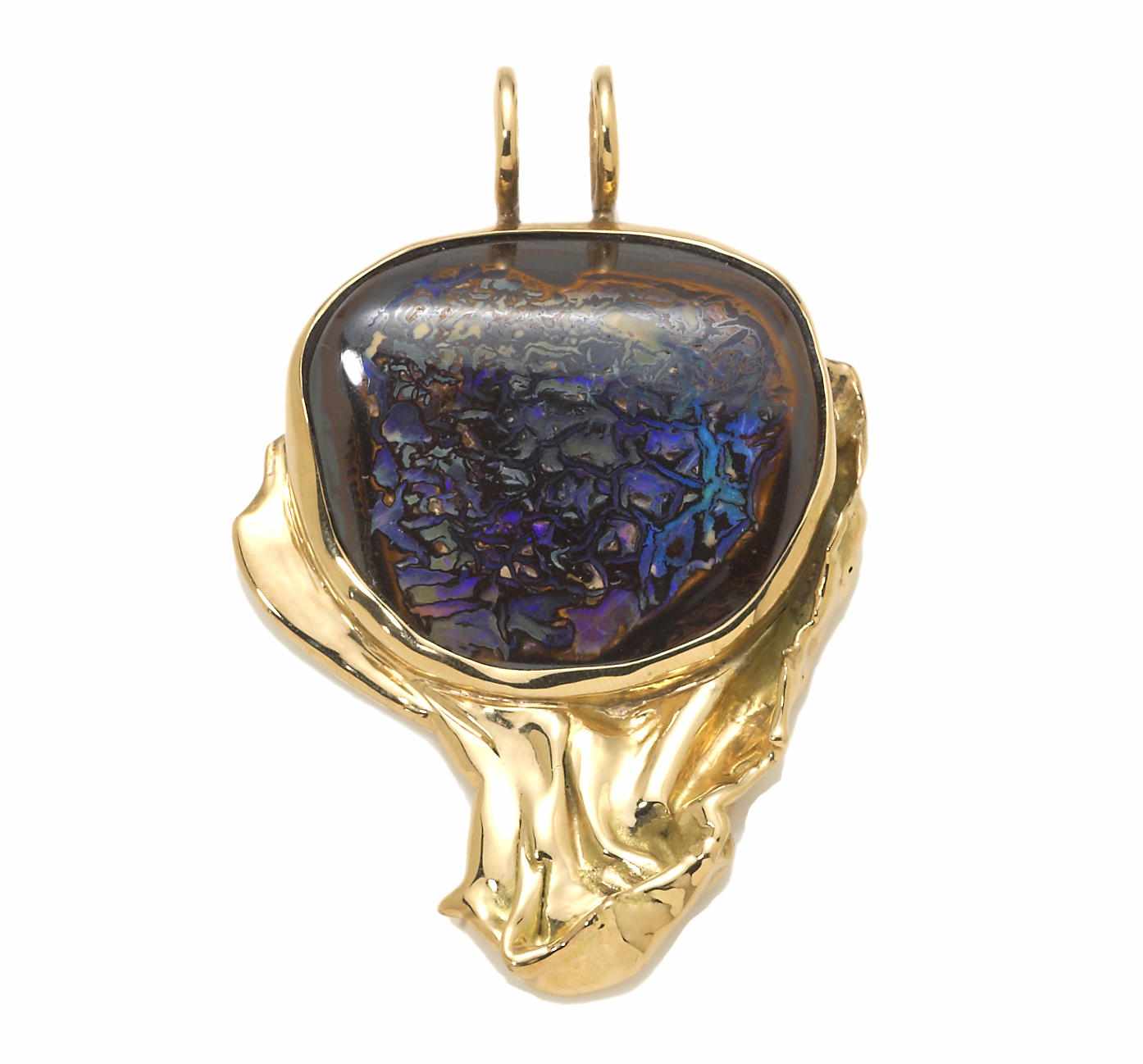 Appraisal: An opal and eighteen karat gold pendant Michael Overstrm free-form