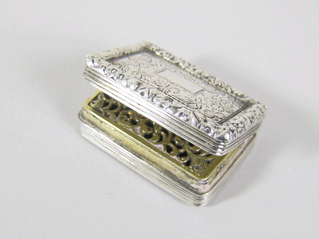 Appraisal: A George IV rectangular Vinaigrette with floral engraving vacant cartouche