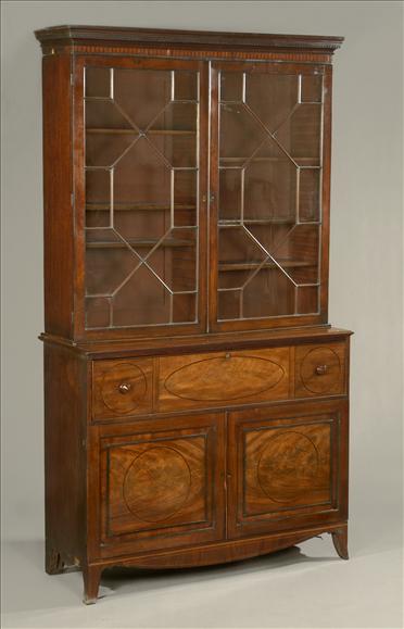 Appraisal: A Regency mahogany bookcase-secretaire circa the adjustable shelves enclosed by