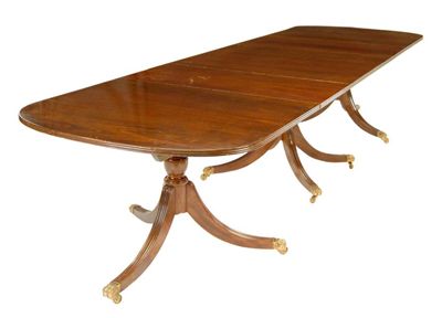 Appraisal: A mahogany triple pillar dining table in George III style