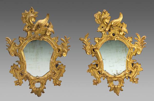 Appraisal: A pair of Continental Rococo giltwood mirrors possibly Italian last