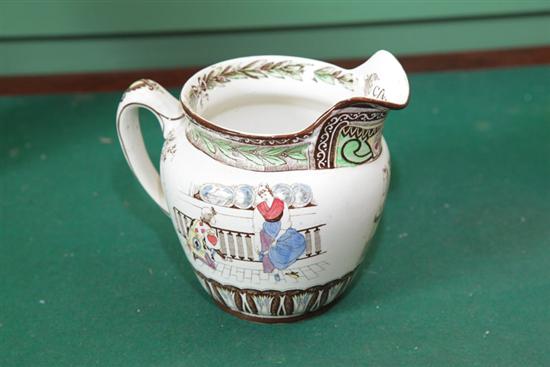 Appraisal: BUFFALO POTTERY PITCHER Polychrome transfer pitcher in ''Cinderella'' pattern ''